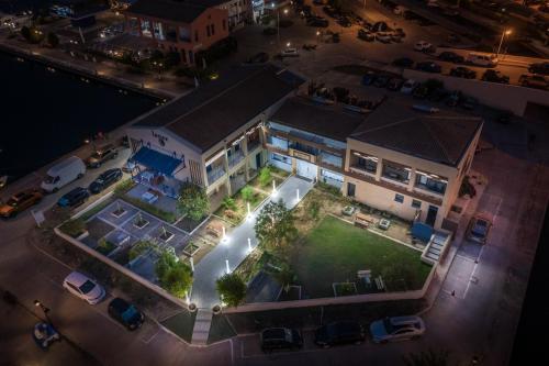 an overhead view of a house with a yard at Ianos Bay in Lefkada Town