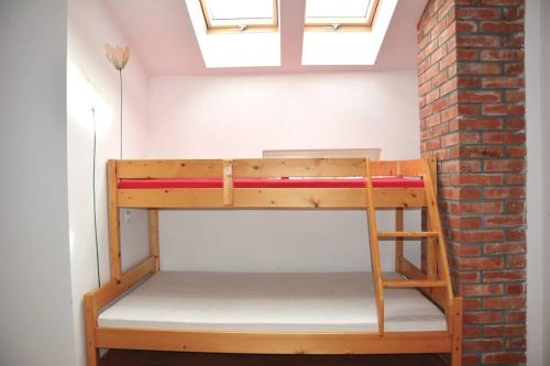 Poschodová posteľ alebo postele v izbe v ubytovaní KukuRyku Zagroda Wiejska nad Bugiem