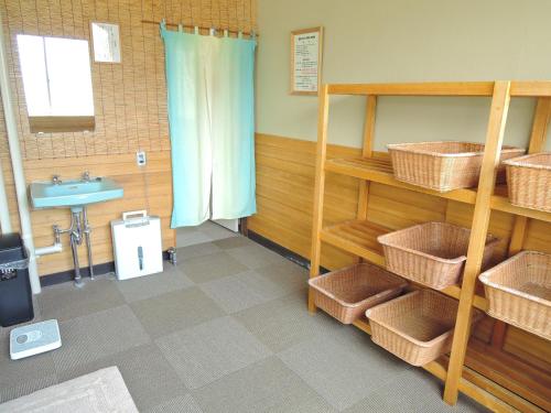 Koupelna v ubytování Maruni Ryokan
