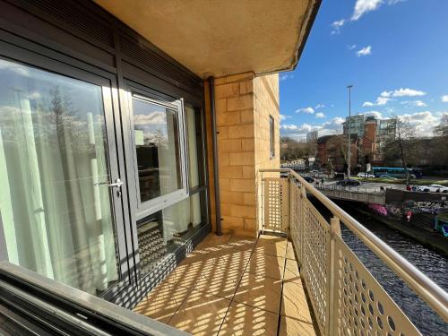 a balcony of a building with a view of a street at Quality City Leicester in Leicester