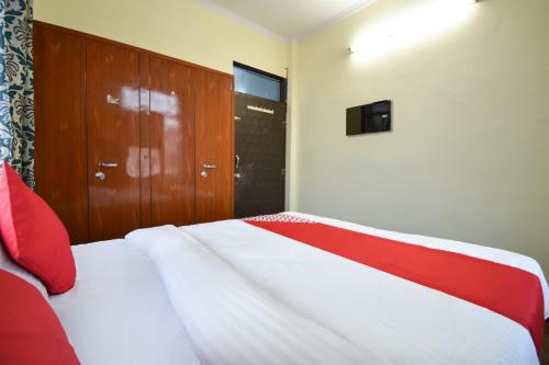 Katil atau katil-katil dalam bilik di Hotel O Pragati Inn