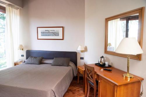 Katil atau katil-katil dalam bilik di Hotel San Giorgio