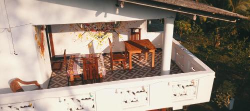 an overhead view of a table and chairs on a house at Romaclan Villa in Midigama East