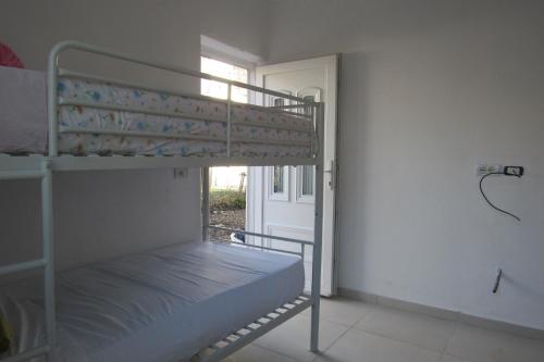 เตียงสองชั้นในห้องที่ Elbasan Backpacker Hostel