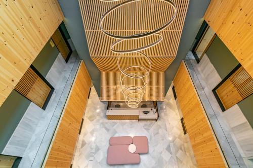 an overhead view of a room with a couch and a chandelier at Holiday Rentals Los Salados in Seville