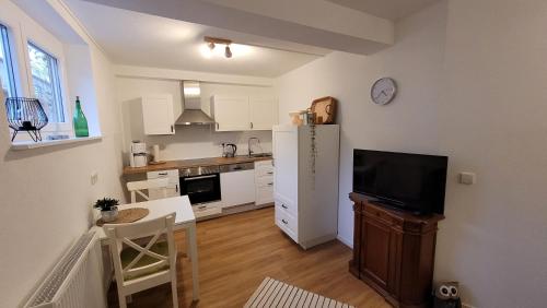 Kuchyň nebo kuchyňský kout v ubytování Blumenschein-Ferienwohnung Unne