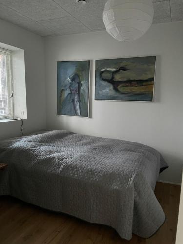 Säng eller sängar i ett rum på Nice modern apartment