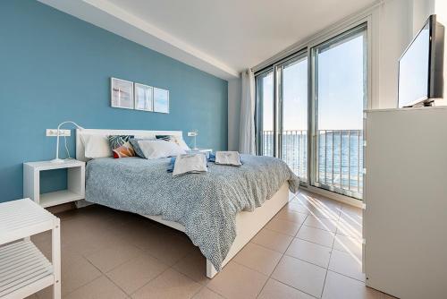 Katil atau katil-katil dalam bilik di Casa L´Augusta II, Casa sobre el mar en Altafulla