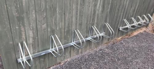 a fence with a bunch of metal hooks on it at Studio - Café Princ pod Hradem, KLIMA, WiFi in Šternberk