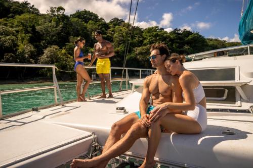 a group of people sitting on a boat at Moon Palace Jamaica - All Inclusive in Ocho Rios