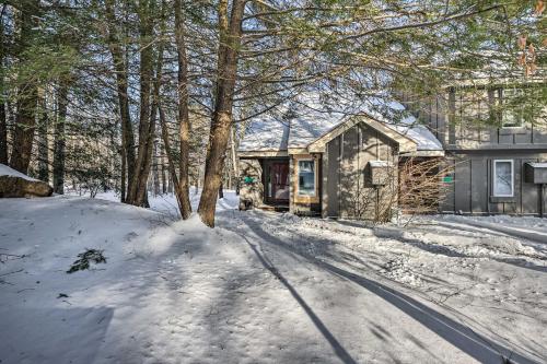 a house in the snow with a tree at Less Than 1 Mi to Jack Frost Lake Harmony Townhome! in Lake Harmony