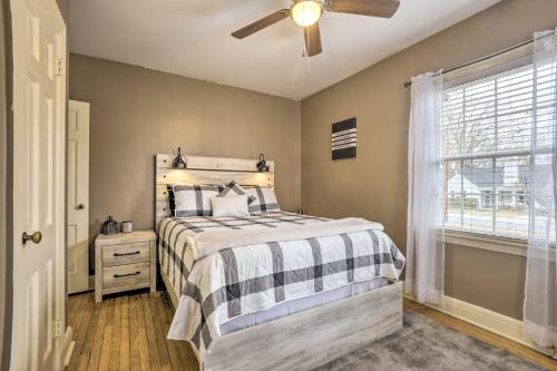 A bed or beds in a room at Chic and Cozy Greensboro Home, 2 Mi to Dtwn!