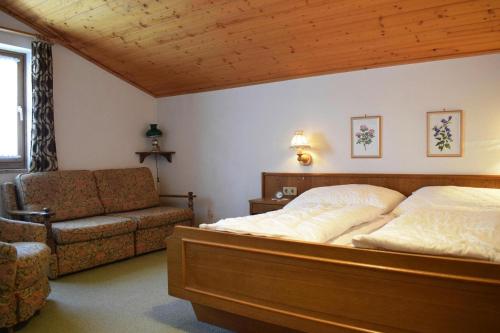 Posteľ alebo postele v izbe v ubytovaní Ferienhaus Niedernsill