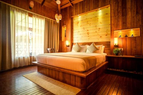 Katil atau katil-katil dalam bilik di Coral Reef Resort & Spa, Havelock