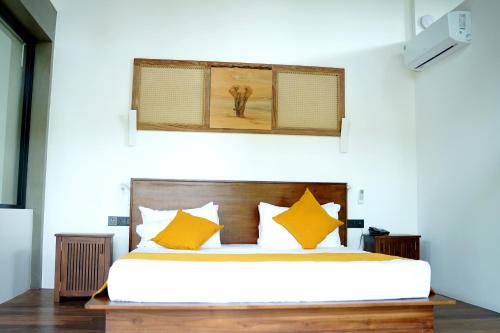 Кровать или кровати в номере Sakuna Arana Resort