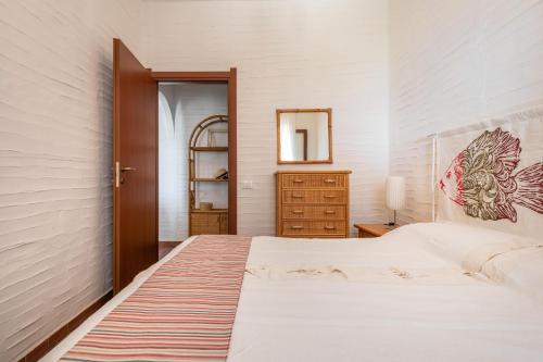 Postel nebo postele na pokoji v ubytování Casa Nicole