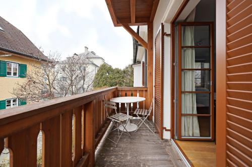 a row of wooden stairs leading to a patio area at numa I Flute Apartments in Salzburg