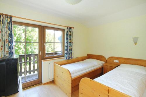 Postel nebo postele na pokoji v ubytování Apartment in Mühltal near Wilder Kaiser Ski Area
