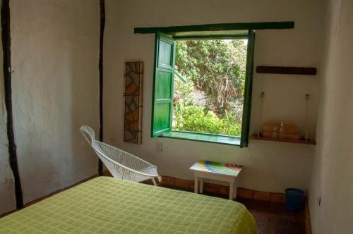 Кровать или кровати в номере Nacuma Garden Hostel - Casa Nacuma