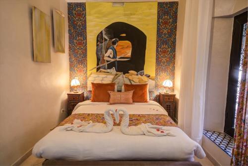 Postel nebo postele na pokoji v ubytování Riad Les Oliviers & Spa