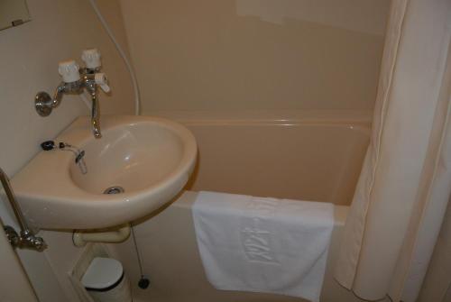 Vonios kambarys apgyvendinimo įstaigoje Swanky Hotel Otomo