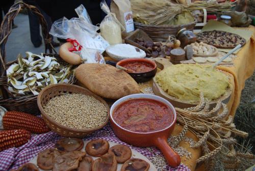 a table topped with lots of different types of food at La Luna nel Borgo in Brugnato