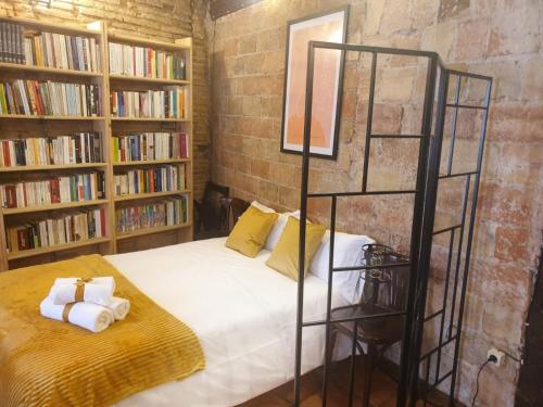 Posteľ alebo postele v izbe v ubytovaní El Rincon de Frida by Apartamentos Logrono