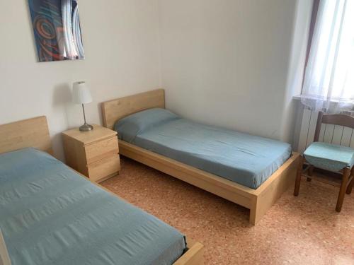Кровать или кровати в номере Vista mozzafiato sul mare!