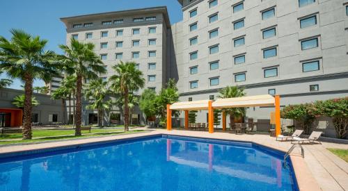 Πισίνα στο ή κοντά στο Real Inn Mexicali
