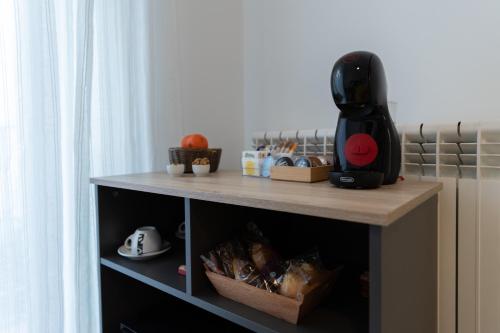Nápoje v ubytování Hostal Puente de Hierro