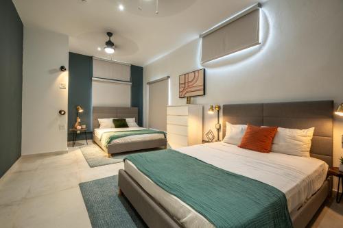 Tempat tidur dalam kamar di La Buena Vida Inn