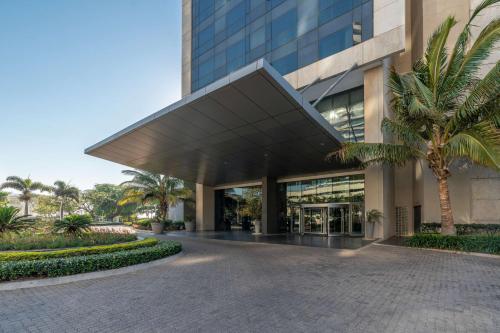 an office building with a large building at Radisson Blu Hotel & Residence Maputo in Maputo