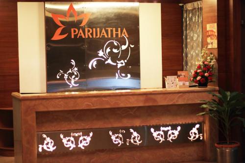 a sign for a paratharmaarmaarmaarmaarmaarmaarmaarmaarma at Parijatha Gateway in Bengaluru