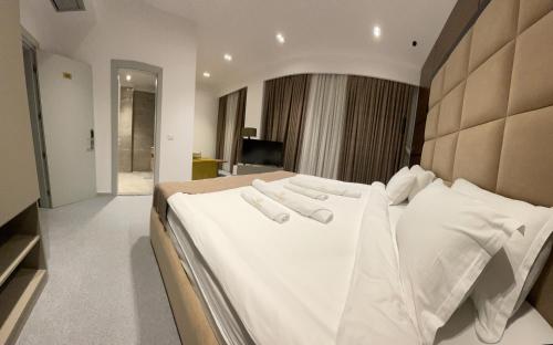Postel nebo postele na pokoji v ubytování Resort Zerja and Spa