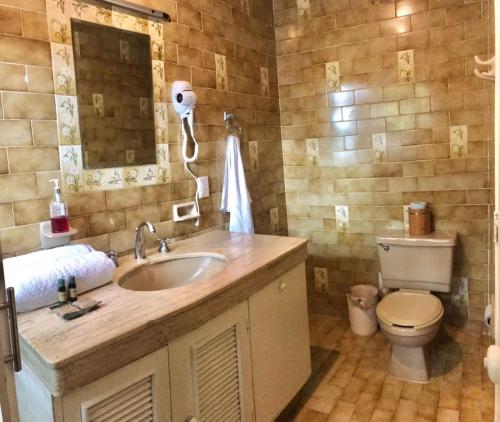 Ett badrum på Hotel Downtown Merida