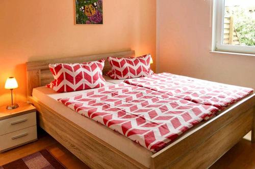 A bed or beds in a room at Semi-detached house, Lubmin