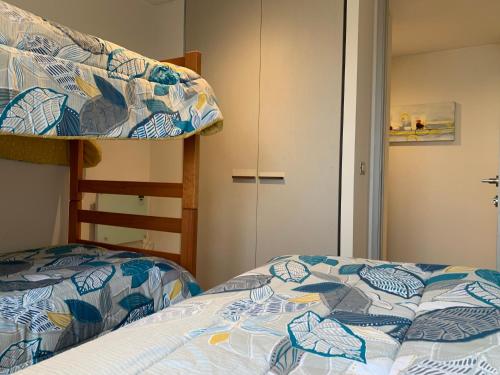 Cama o camas de una habitación en Tantum Concon Apartment