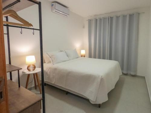 Cama ou camas em um quarto em Cerrado Ville