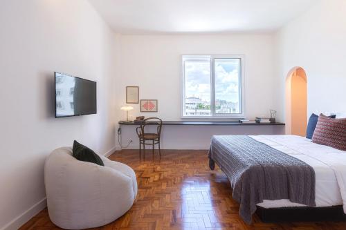 Postel nebo postele na pokoji v ubytování Vossa Bossa Marian