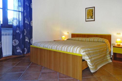 Postel nebo postele na pokoji v ubytování Apartment in Vinci with Pool & Wellness