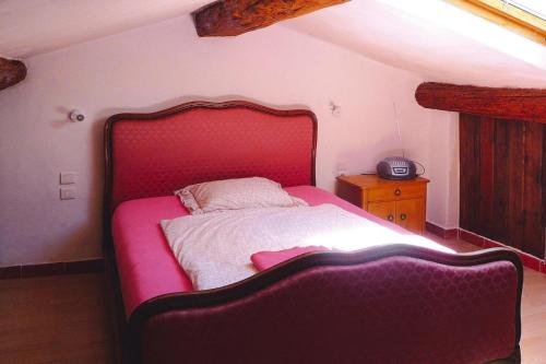 A bed or beds in a room at Semi-detached house, Noves