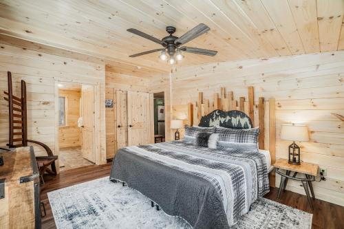 Postel nebo postele na pokoji v ubytování The Cozy Cabin