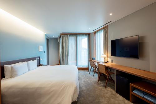TV a/nebo společenská místnost v ubytování HOTEL AO KAMAKURA