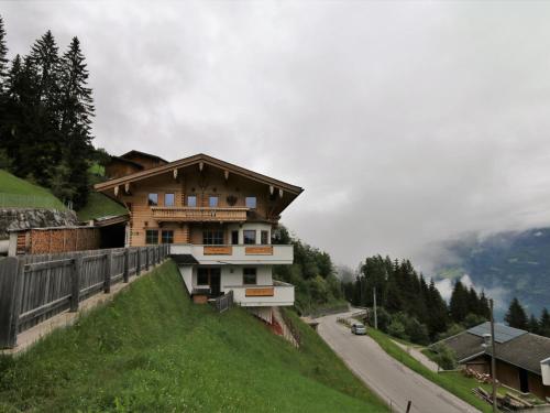 a house on the side of a hill at Apartment in Fügenberg near Spieljochbahn in Fügenberg