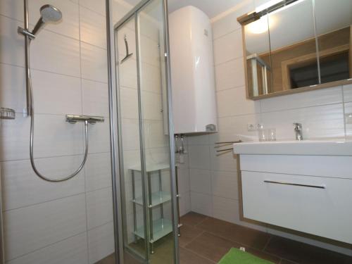 A bathroom at Apartment in Bramberg am Wildkogel with balcony
