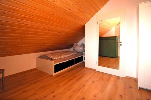 Postel nebo postele na pokoji v ubytování Ferienhaus am Partwitzer See, Elsterheide