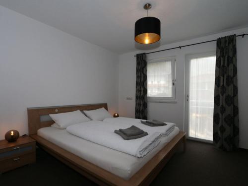 Posteľ alebo postele v izbe v ubytovaní Holiday flat Daniela, Hippach im Zillertal