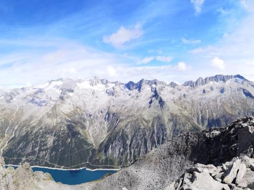 a view of a mountain range with a lake at Apartment in Hippach near Mayrhofen Ski Area in Hippach