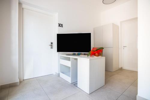 TV a/nebo společenská místnost v ubytování J Rooms