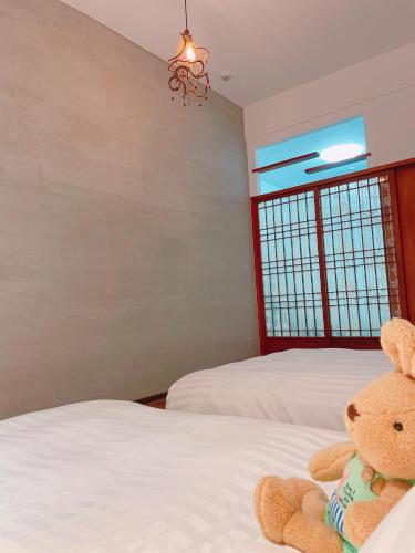 Una cama o camas en una habitación de Sweet House